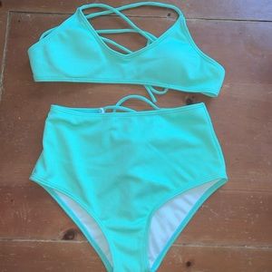 Bathing suit with high waisted bottoms